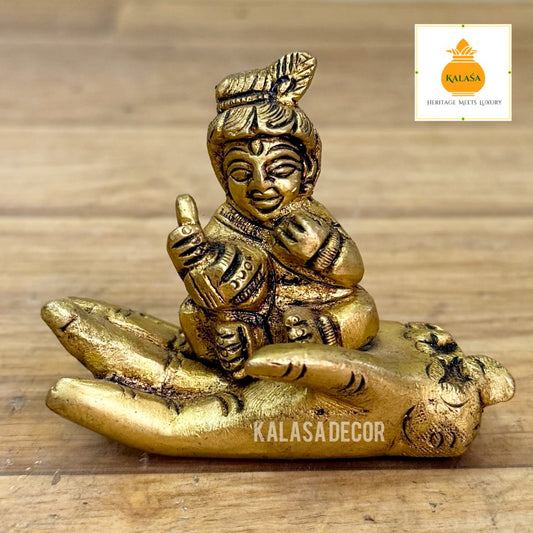 Brass Little Krishna on Hand – Unique Devotional Showpiece | Bal Krishna Brass Idol (2.25 Inch)