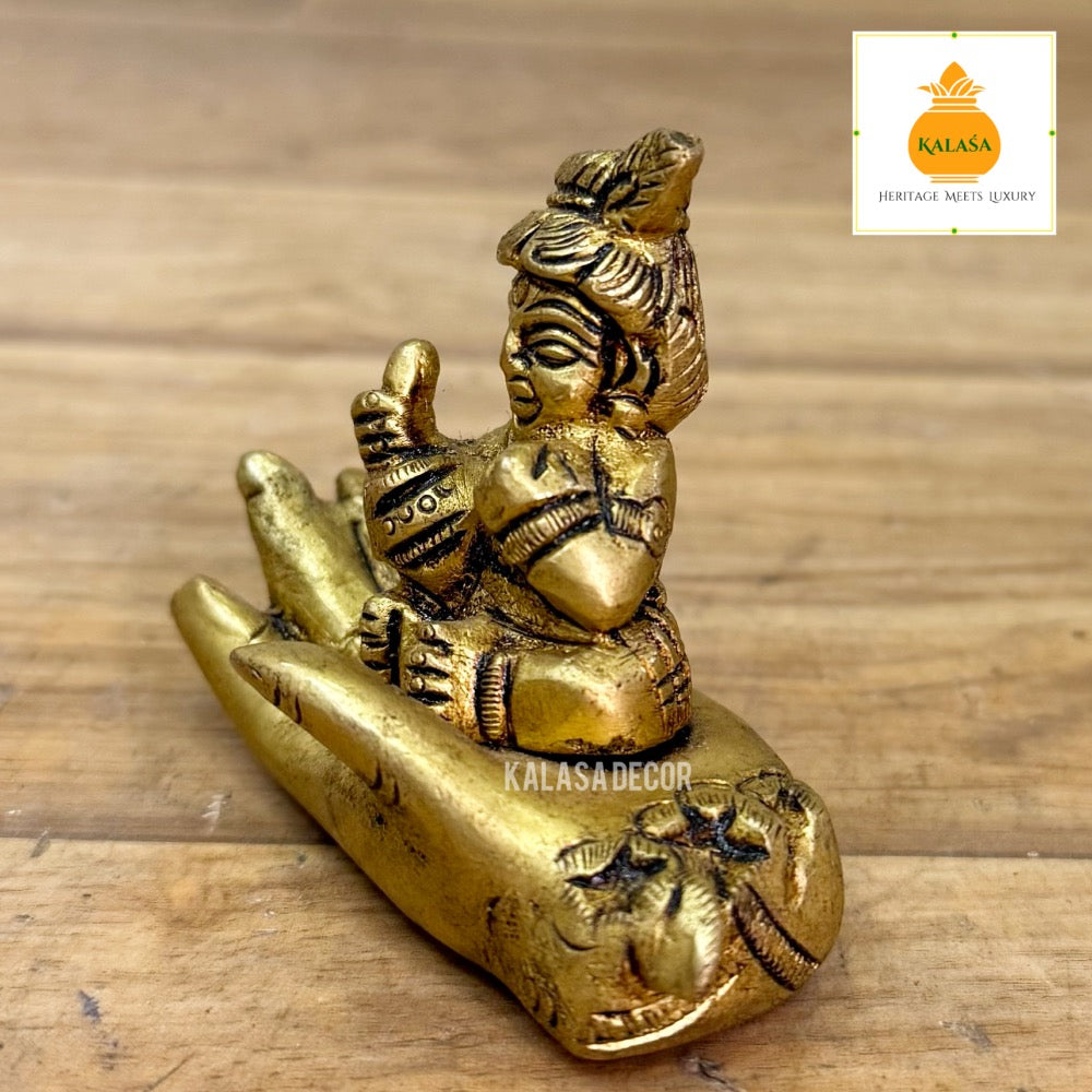 Brass Little Krishna on Hand – Unique Devotional Showpiece | Bal Krishna Brass Idol (2.25 Inch)